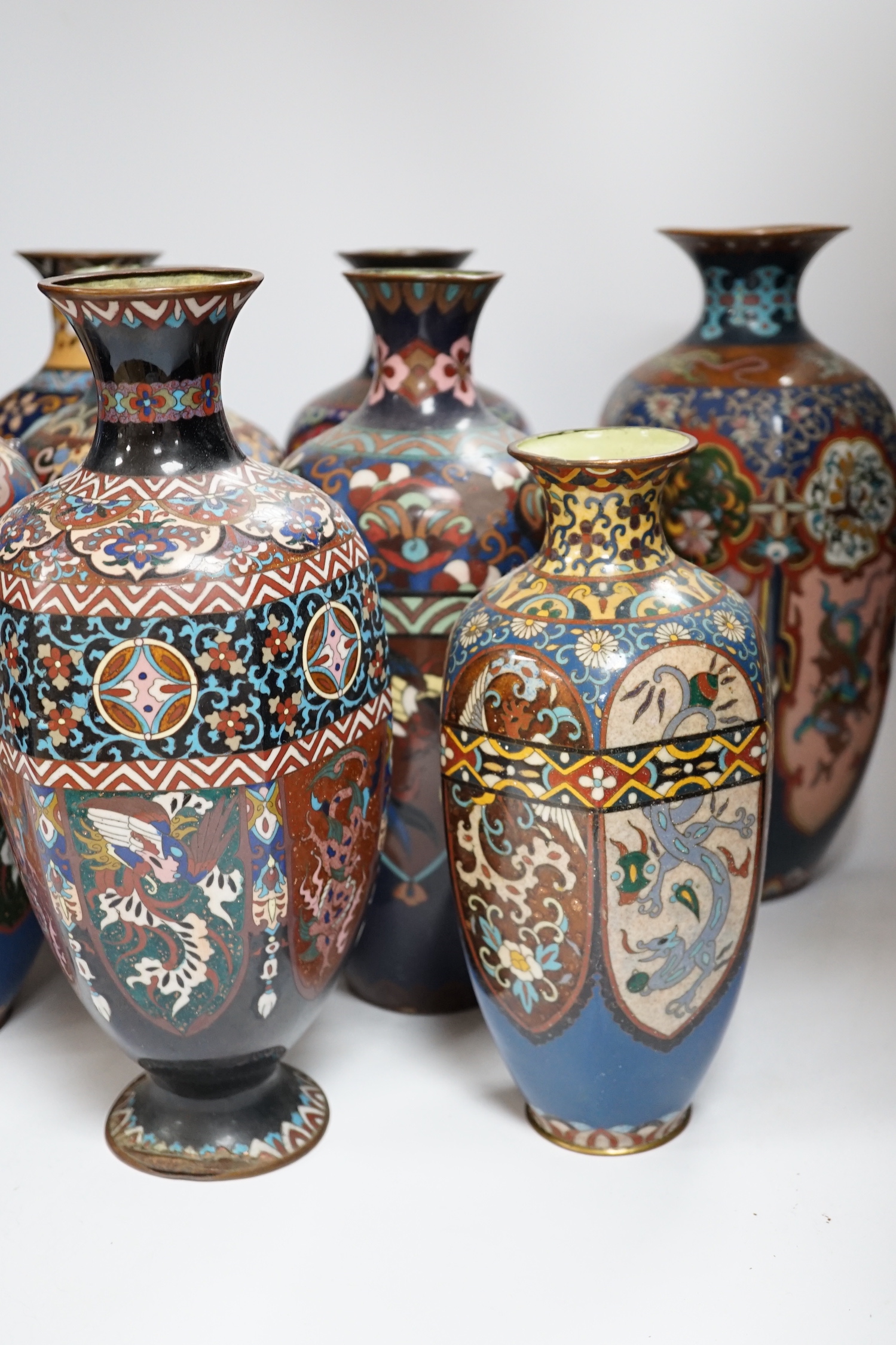 Eight Japanese cloisonné enamel vases, early 20th century, largest 30cm high